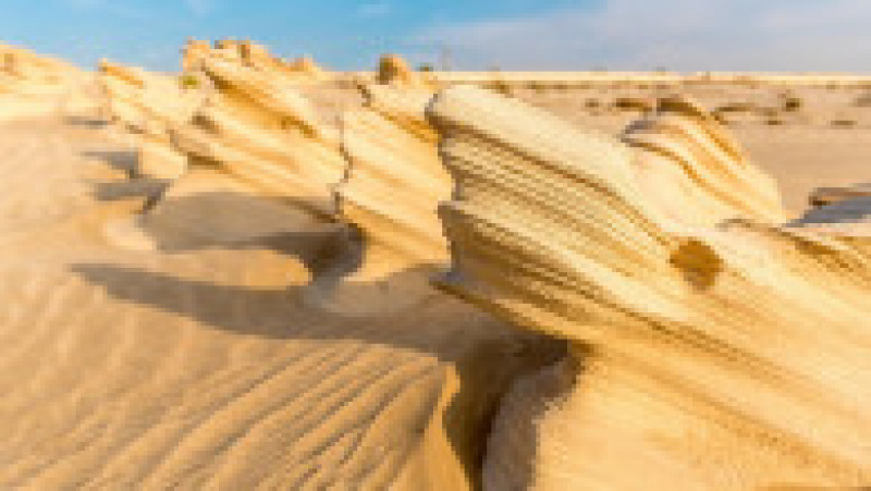 În deșertul Al Wathba din Abu Dhabi, dunele fosilizate, vechi de 150.000 de ani, au devenit o atracție turistică. Foto: Profimedia | Poza 11 din 11