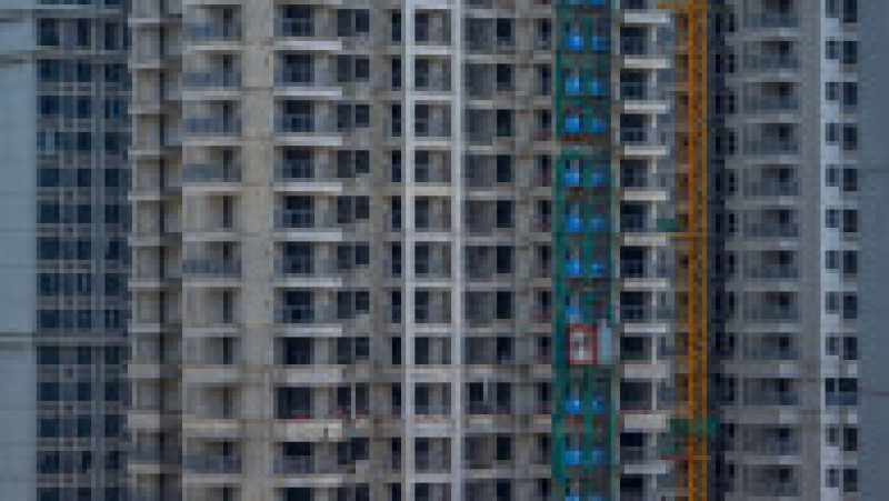 Cumpărătorii chinezi de locuințe disperați din zeci de orașe refuză să plătească creditele pentru proiectele imobiliare nefinalizate. Foto-Profimedia | Poza 6 din 7