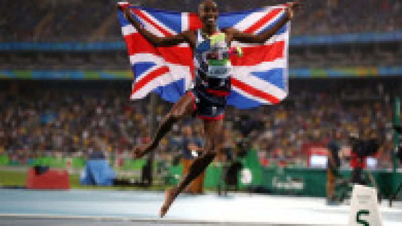 Multiplu campion olimpic la altletism, Mo Farah a ajuns în Marea Britanie la 9 ani, adus de traficanți pentru a lucra ca servitor. Foto-Profimedia Images | Poza 9 din 10
