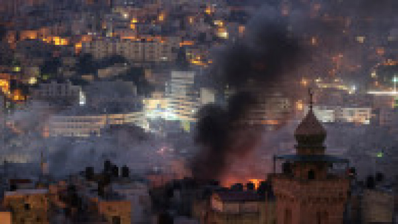Fum deasupra orașului Nablus, după operațiunea israeliană. Foto: Profimedia | Poza 7 din 12