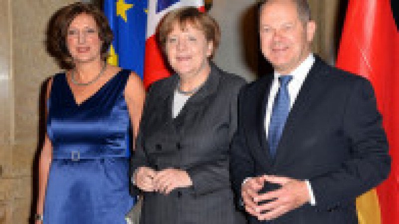 Angela Merkel, alături de Britta Ernst și Olaf Scholz la un eveniment din 2016 Foto: Profimedia Images | Poza 25 din 25