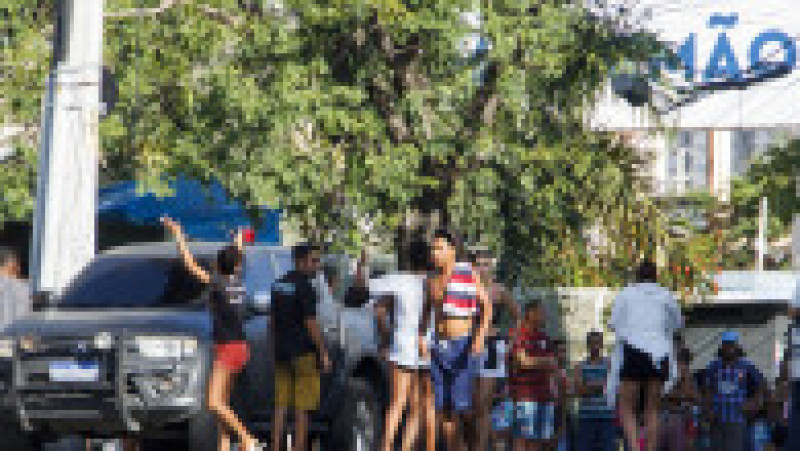 Cel puţin 18 oameni au murit într-o operaţiune a poliţiei braziliene într-o favela din Rio de Janeiro. Foto: Profimedia | Poza 1 din 19