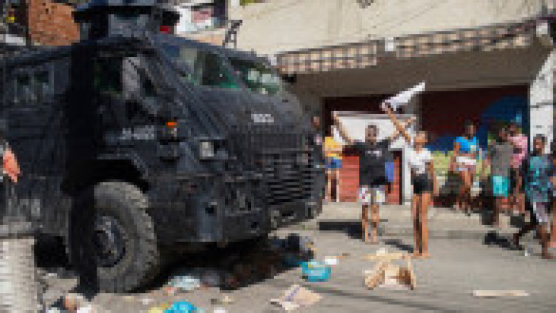 Cel puţin 18 oameni au murit într-o operaţiune a poliţiei braziliene într-o favela din Rio de Janeiro. Foto: Profimedia | Poza 19 din 19