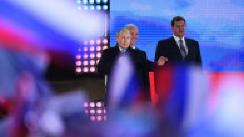 Vladimir Putin, prezent la concertul din Piața Roșie prin care rușii sărbătoresc anexarea ilegală a celor patru regiuni ucrainene. Foto: Profimedia Images | Poza 3 din 7
