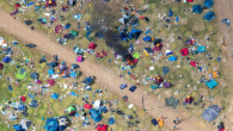 Imagini surprinse din dronă cu dezastrul lăsat în urmă de spectatori la Festivalul Reading din Anglia FOTO: Profimedia Images | Poza 22 din 33