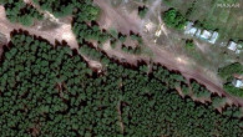 Imaginile din satelit arată cum s-a extins cimitirul din Izium, ascuns de ruși în pădure. FOTO: Profimedia Images | Poza 1 din 5