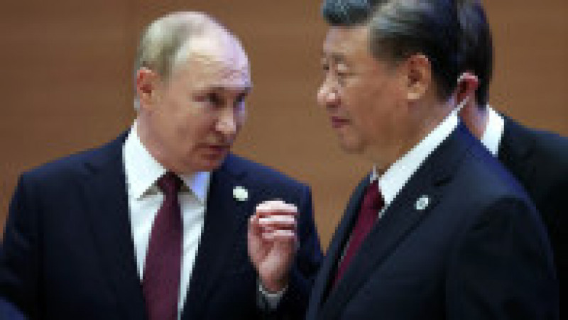 Vladimir Putin pare că vrea să-i capteze atenția lui Xi Jinping Foto: Profimedia Images | Poza 9 din 18