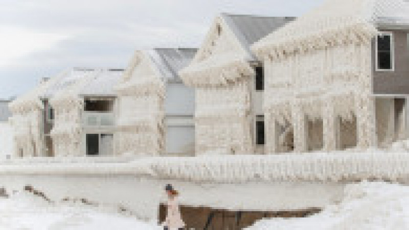 Case acoperite complet de gheață. Imagini incredibile pe malul lacului Erie. FOTO: Profimedia Images | Poza 8 din 14