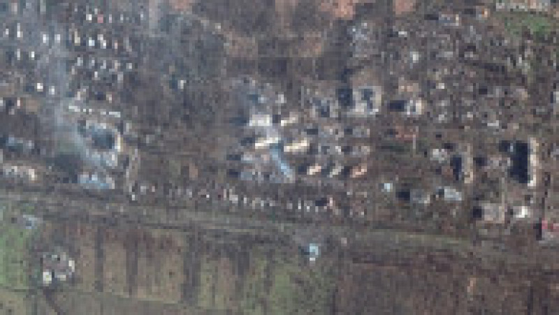 Imagine din satelit făcută pe 4 ianuarie 2023 de Maxar Technologies, care arată clădiri de apartamente și cratere distruse în Bakhmut. Foto: Profimedia Images | Poza 1 din 10