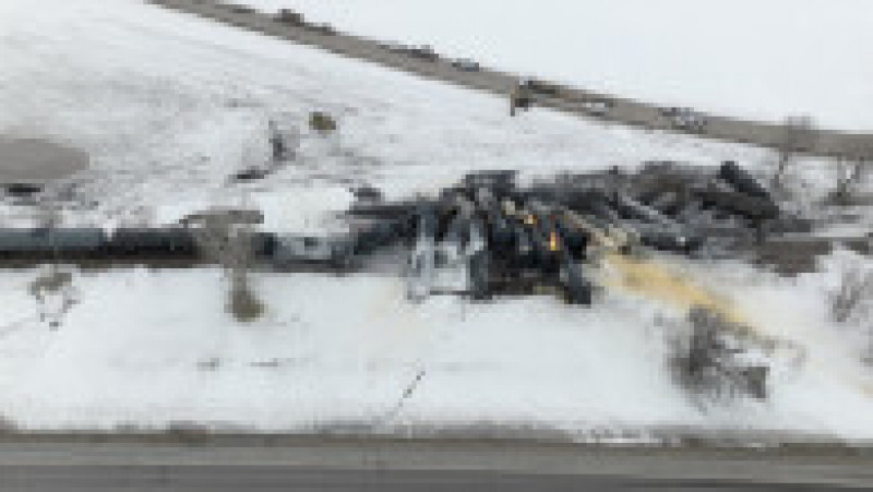 Un tren a deraiat în cursul zilei de joi în SUA, iar mai multe dintre vagoanele-cisternă în care se afla etanol au luat foc. Foto: Profimedia Images | Poza 1 din 5