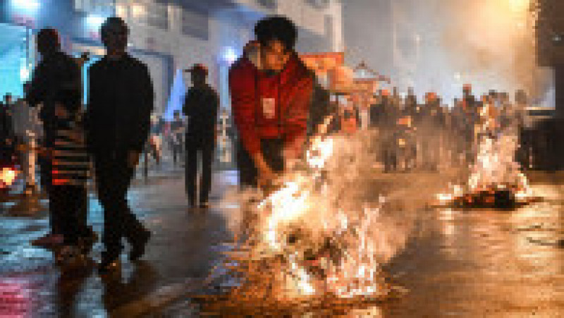 Sărbătoarea de Anul Nou chinezesc este centrată în special asupra eliminării lucrurilor care sunt rele și vechi și întâmpinarea lucrurilor bune și noi. Foto: Profimedia Images | Poza 16 din 18