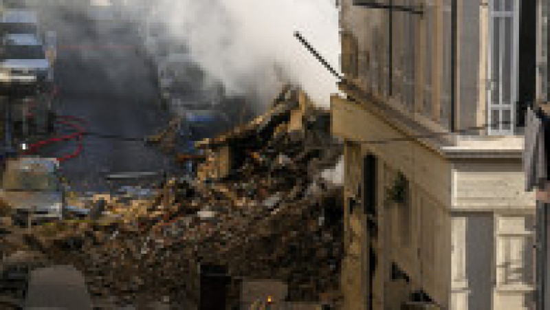 Un bloc s-a prăbușit după ce a fost auzită o explozie puternică în cartierul central La Plaine din Marsilia. Foto: Profimedia Images | Poza 8 din 13