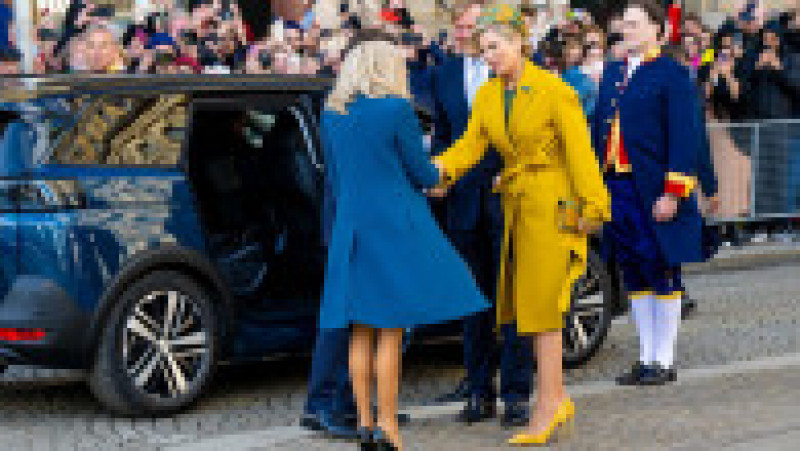 Emmanuel și Brigitte Macron, întâmpinați la Amsterdan de regele Willem-Alexander şi soţia lui, Maxima FOTO: Profimedia Images | Poza 10 din 43