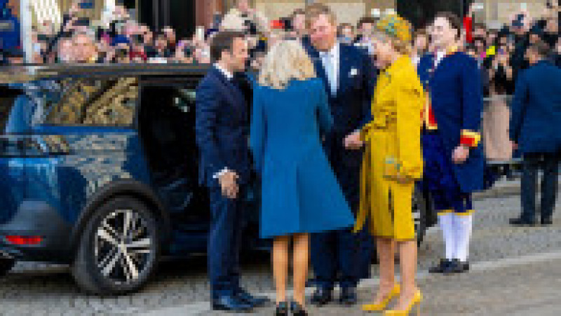 Emmanuel și Brigitte Macron, întâmpinați la Amsterdan de regele Willem-Alexander şi soţia lui, Maxima FOTO: Profimedia Images | Poza 11 din 43