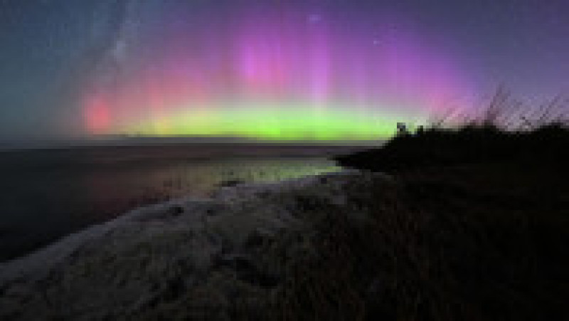 O uriașă explozie de energie solară a colorat cerul Noii Zeelande în nuanțe superbe de mov, portocaliu și verde. Foto: Profimedia Images | Poza 2 din 6