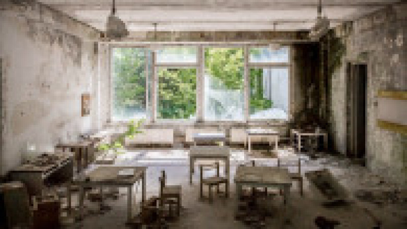 Abia la 36 de ore de la dezastru au început evacuările în Pripiat, o localitate cu 50.000 de locuitori, situată la un kilometru şi jumătate de centrală. Sursa foto Profimedia Images | Poza 21 din 30