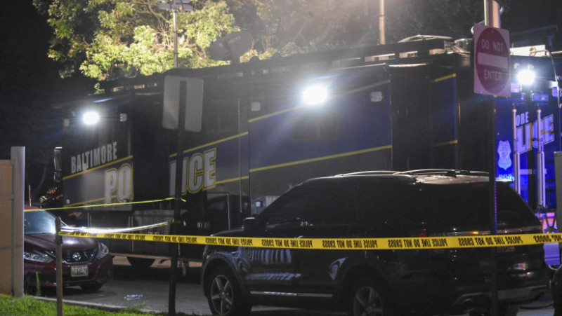 Cel puțin două persoane au fost ucise și alte 30 au fost grav rănite în urma unui atac armat care a avut loc în Baltimore, SUA. FOTO: Profimedia Images