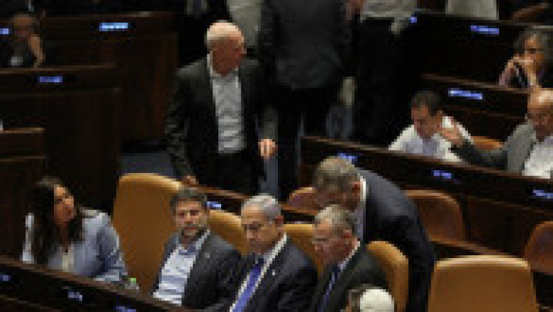 Parlamentul israelian a adoptat luni cu 64 de voturi din 120 o lege privind restructurarea puterii judecătoreşti prin restrângerea atribuţiilor Curţii Supreme. FOTO: Profimedia Images | Poza 3 din 6