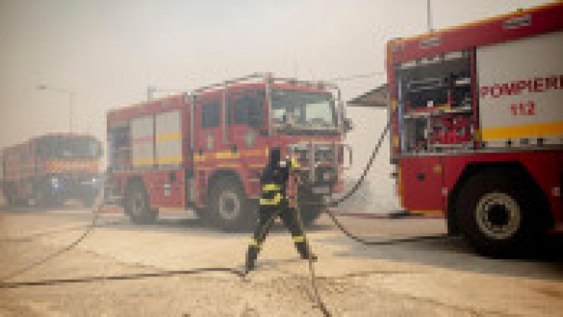 Pompierii români, care au fost trimiși să-i ajute pe cei greci în lupta cu incendiile devastatoare, au fost lăudați de localnicii din Grecia, dar și de autorități. FOTO: Profimedia Images | Poza 6 din 7