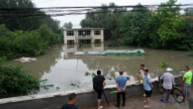 Cel puțin 11 morți în urma ploilor din Beijing. Orașele din nordul Chinei sunt în alertă de dezastru. FOTO: Profimedia Images | Poza 7 din 8