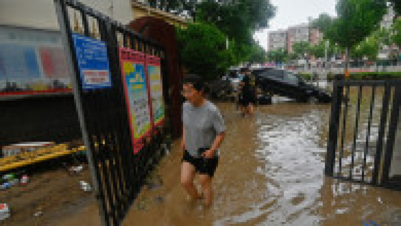 Cel puțin 11 morți în urma ploilor din Beijing. Orașele din nordul Chinei sunt în alertă de dezastru. FOTO: Profimedia Images | Poza 1 din 8