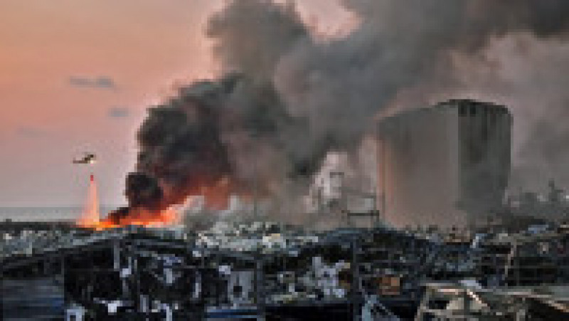 O serie de explozii puternice s-au produs pe 4 august 2020 în Beirut, devastând portul capitalei Libanului și provocând daune uriașe și numeroase victime. Cea mai puternică dintre aceste explozii a fost şi una dintre cele mai puternice explozii din istorie care nu a fost produsă de o bombă nucleară. Sursa foto: Profimedia Images | Poza 16 din 30