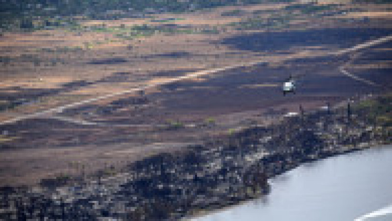 Flăcările au distrus cea mai mare parte din orașul istoric Lahaina și incendiile sunt Maui sunt considerate acum cel mai mare dezastru natural din istoria statului Hawaii. Sursa foto Profimedia Images | Poza 20 din 21