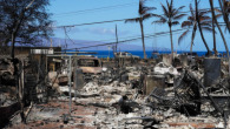 Flăcările au distrus cea mai mare parte din orașul istoric Lahaina și incendiile sunt Maui sunt considerate acum cel mai mare dezastru natural din istoria statului Hawaii. Sursa foto Profimedia Images | Poza 12 din 21