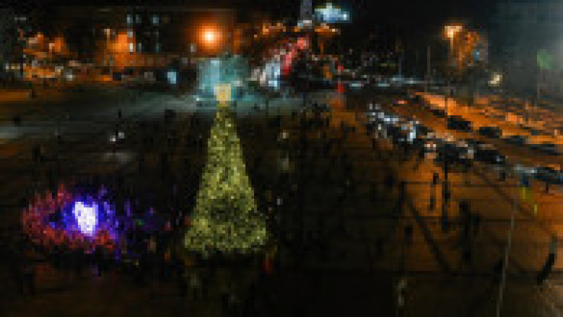 Primarul Kievului a aprins luminițele în uriașul brad de Crăciun din fața catedralei Sfânta Sofia. FOTO: Profimedia Images | Poza 27 din 34