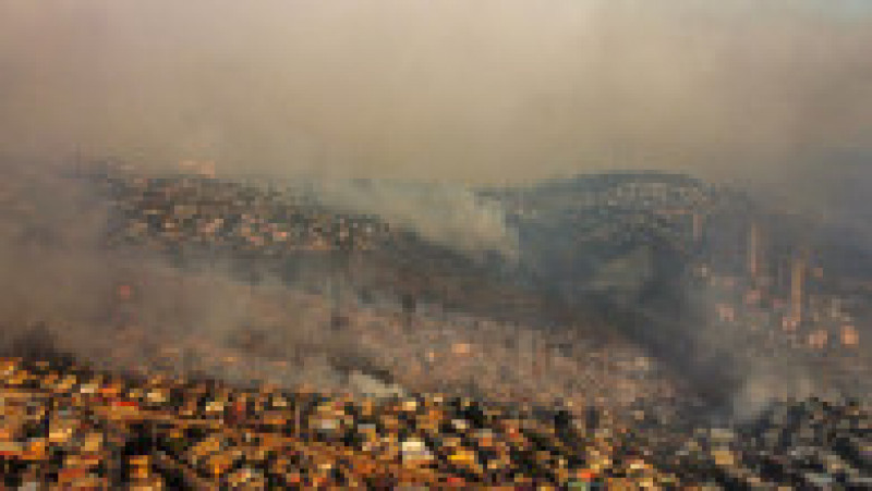 Cel puţin 64 de persoane şi-au pierdut viaţa în incendiile care fac ravagii în regiunea Valparaiso din centrul Chile. FOTO: Profimedia Images | Poza 7 din 9