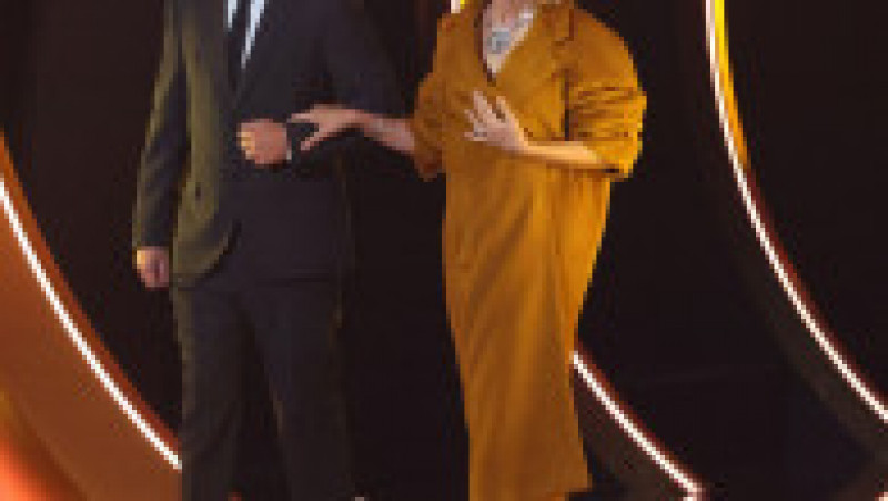 Cântăreaţa canadiană Celine Dion, care a fost diagnosticată cu sindromul persoanei rigide, a urcat pe scena ceremoniei de decernare a Premiilor Grammy 2024 pentru a înmâna premiul "Albumul anului" FOTO: Profimedia Images | Poza 23 din 31
