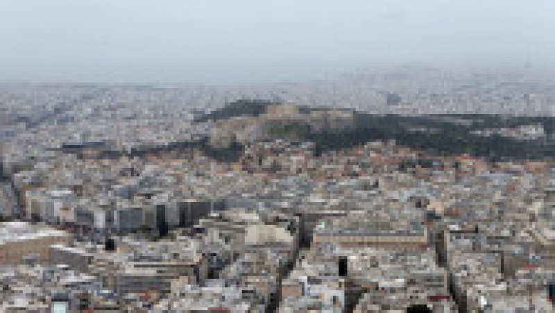 Atena este invadată de nori groşi de nisip provenind din Deşertul Sahara şi din Africa de Nord. FOTO: Profimedia Images | Poza 4 din 5
