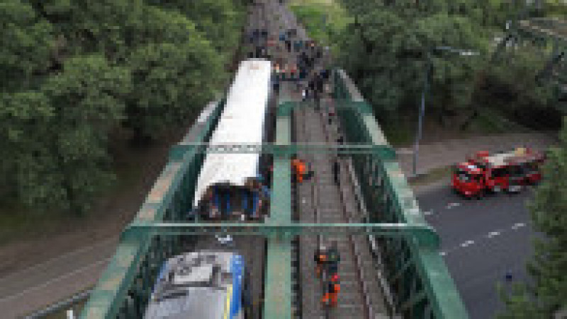 Un tren de navetişti a intrat în coliziune cu un tren de întreţinere a căilor ferate în capitala Buenos Aires. Foto: Profimedia | Poza 2 din 6