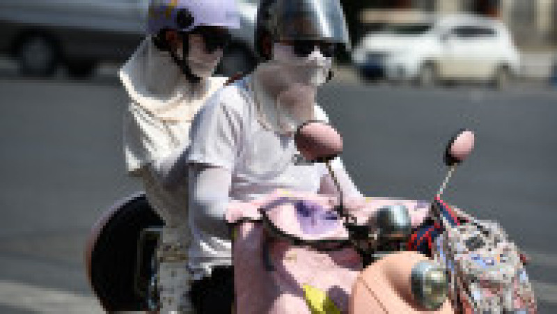 Oamenii se feresc de caniculă. Foto: Profimedia Images | Poza 2 din 8