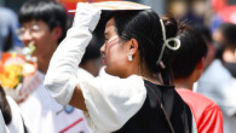 Oamenii se feresc de caniculă. Foto: Profimedia Images | Poza 7 din 8