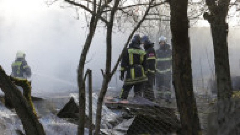 Rescuers work at the site of a drone attack in the village of Stanovoye, Moscow region, on November 10, 2024. Russia