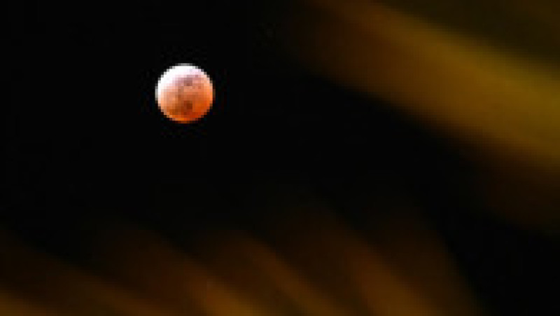 Lună roşie cu ocazia unei eclipse totale. Foto: Profimedia | Poza 11 din 19