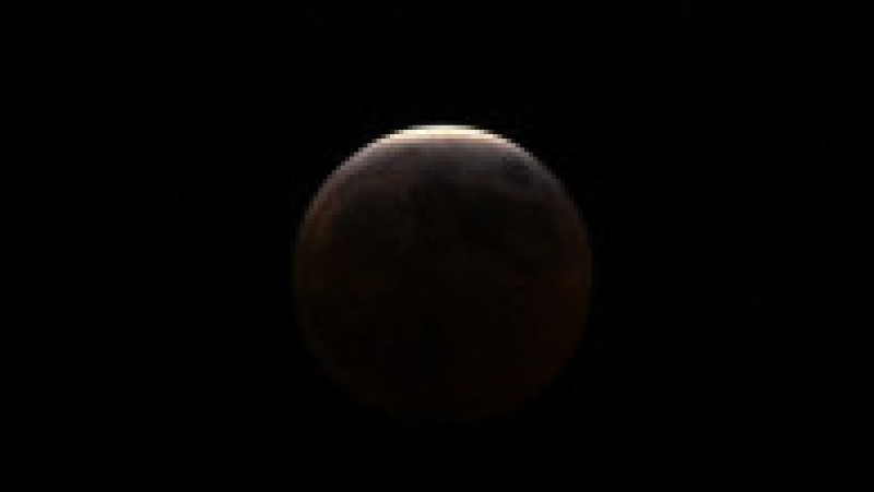 Lună roşie cu ocazia unei eclipse totale. Foto: Profimedia | Poza 9 din 19
