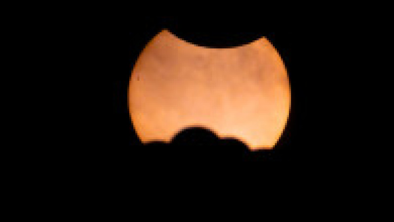 Eclipsa parțială de Soare, văzută din Barcelona, Spania. Sursa foto: Profimedia Images | Poza 2 din 10