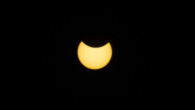 Eclipsa parțială de Soare, văzută din Lisabona, Portugalia. Sursa foto: Profimedia Images | Poza 6 din 10