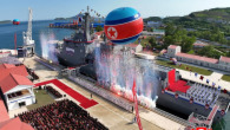 Kim Jong-un și fiica sa Ju Ae au participat la ceremonia de lansare a navei „Kang Kon” la șantierul naval Rajin. Sursa foto: Profimedia Images | Poza 1 din 11