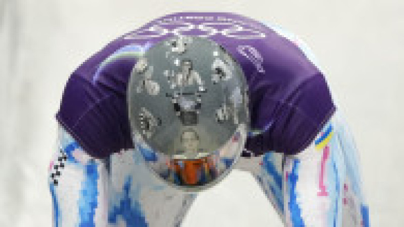 Ucraineanul Vladyslav Heraskevich va concura la skeleton la Jocurile Olimpice de la Milano-Cortina, purtând casca sa care conţine portrete ale sportivilor şi antrenorilor ucişi de invazia rusă. Foto: Profimedia Images | Poza 2 din 4