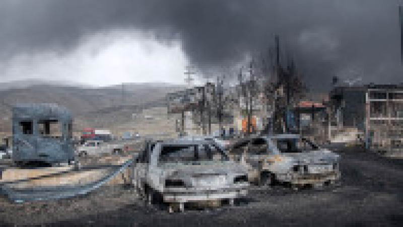 Norii de fum se ridică deasupra rezervoarelor depozitului de petrol lovite de raidurile comune ale Israelului și Statelor Unite în timpul nopții, într-o stație situată la nord-vest de capitala Teheran, în Iran, duminică, 8 martie 2026. Foto: Profimedia | Poza 4 din 5