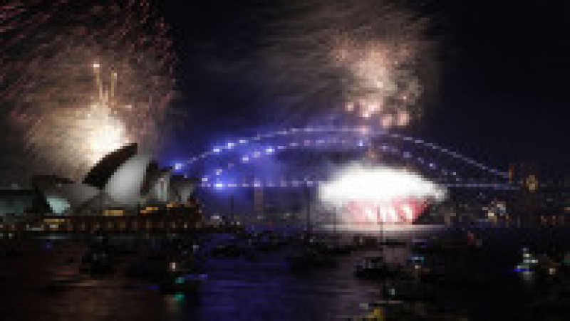 Foc de artificii la Sydney cu ocazia trecerii în Anul Nou 2022. Foto: Profimedia Images | Poza 8 din 17