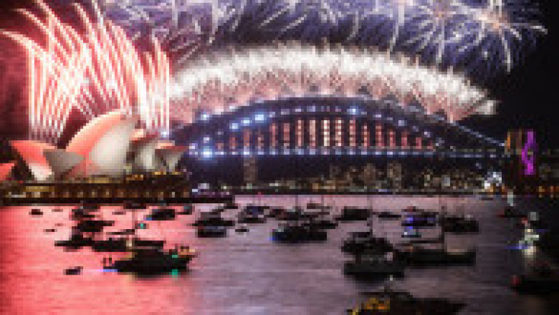 Foc de artificii la Sydney cu ocazia trecerii în Anul Nou 2022. Foto: Profimedia Images | Poza 1 din 17