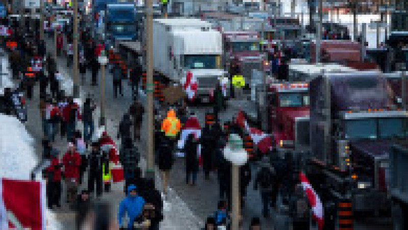 Peste 10.000 de oameni și sute de vehicule, majoritatea camioane, au blocat centrul capitalei federale a Canadei. FOTO: Profimedia Images | Poza 7 din 7