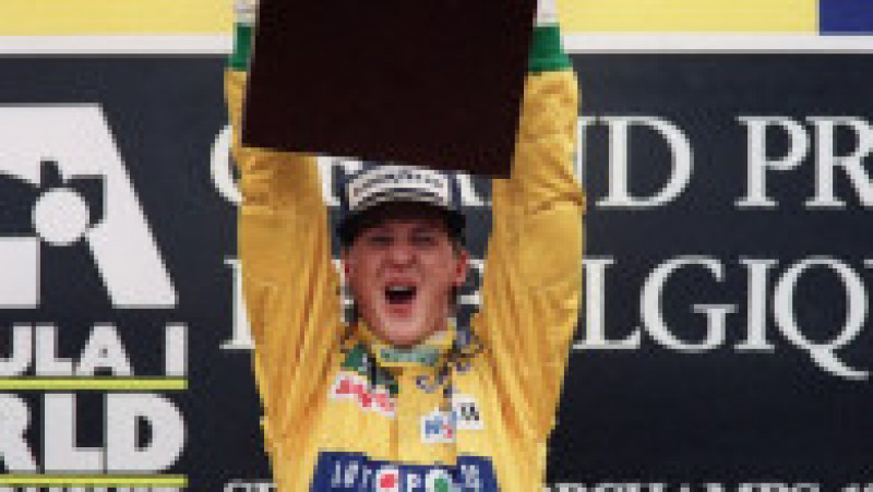 Michael Schumacher după ce a câștigat primul lui Grand Prix. Sursa foto: Profimedia Images | Poza 1 din 14