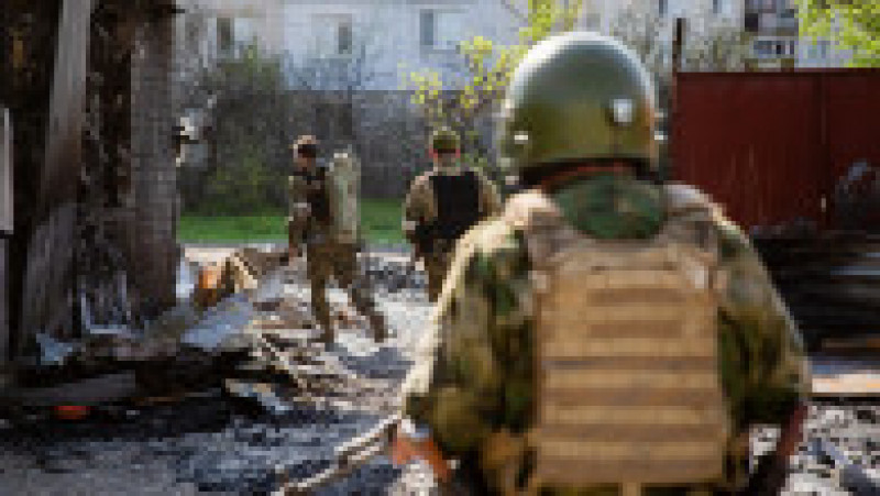 Luptători ceceni, care fac parte din armata rusă de invazie a Ucrainei, surprinși în Lugansk. Foto: Profimedia Images | Poza 6 din 8
