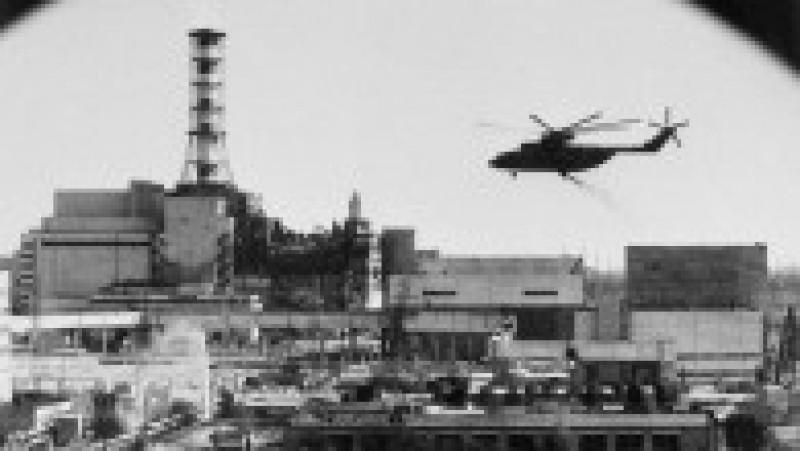In May 1986, a helicopter carries out decontamination work at the Chernobyl nuclear power plant