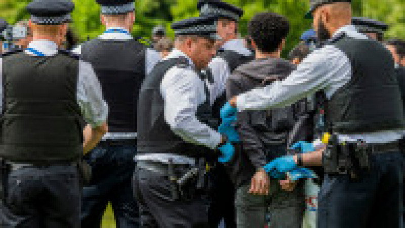 Some people debate with the police and this man ends up being arrested - The picnic moves and, once resettled, the police start to break up large groups - A so called 